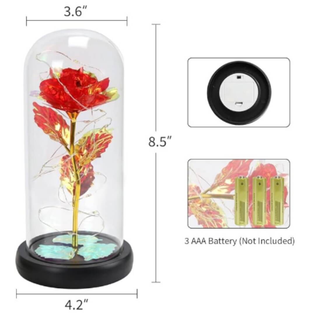 Artificial rose in glass dome